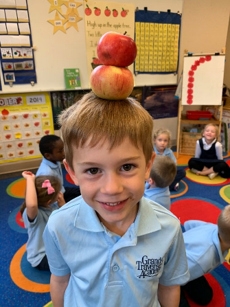 boy with apples on head