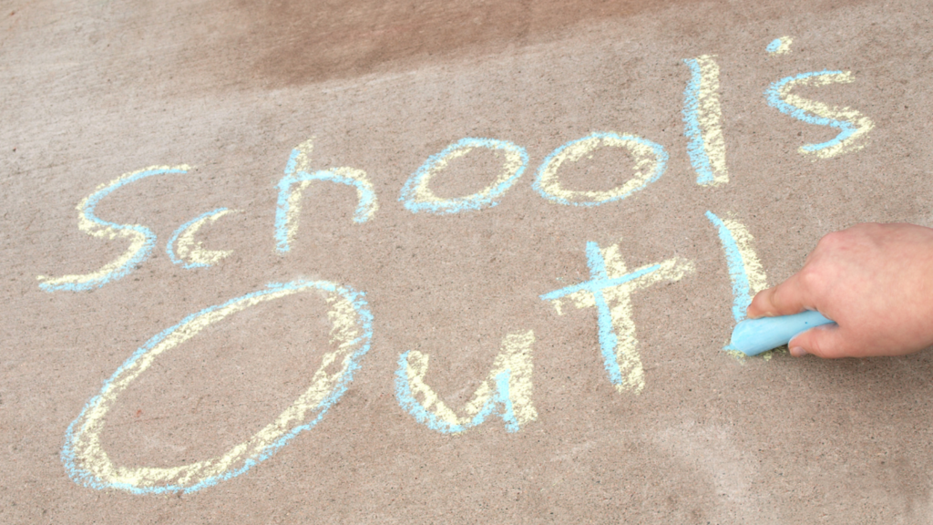 school's out in chalk on sidewalk